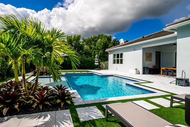 view of pool with a patio