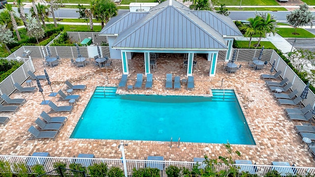 view of swimming pool featuring a patio area