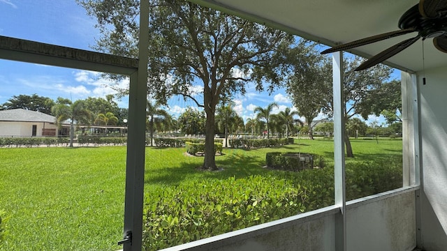 view of yard featuring ceiling fan