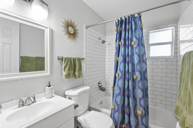 full bathroom featuring vanity, toilet, and shower / bath combo with shower curtain