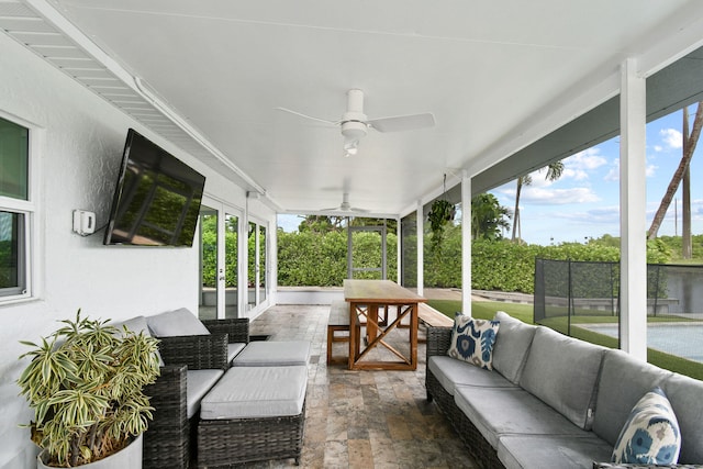 view of patio / terrace featuring ceiling fan, outdoor lounge area, and french doors