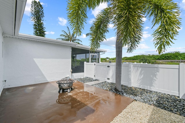 view of patio / terrace featuring a fire pit