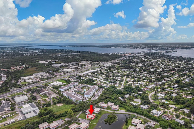 drone / aerial view with a water view