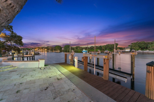 dock area with a water view