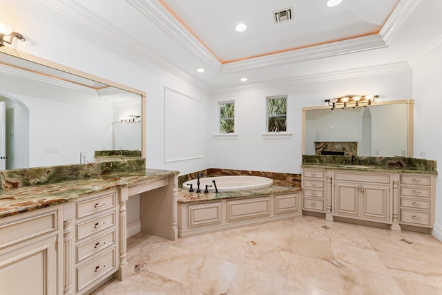 13058 Flamingo Ter, Palm Beach Gardens, FL 33410 - bathroom featuring ornamental molding, a bath, vanity, a tray ceiling, and recessed lighting