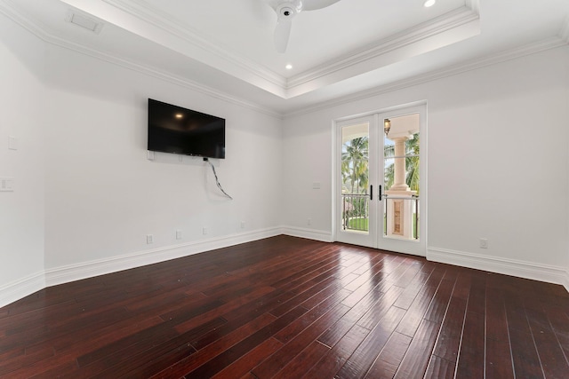 empty room with crown molding, ceiling fan, and dark hardwood / wood-style floors