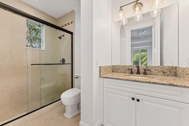 13058 Flamingo Ter, Palm Beach Gardens, FL 33410 - full bathroom with a shower stall, toilet, and vanity