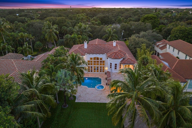 view of aerial view at dusk