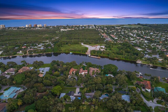 13058 Flamingo Ter, Palm Beach Gardens, FL 33410 - aerial view at dusk of a water view and a residential view