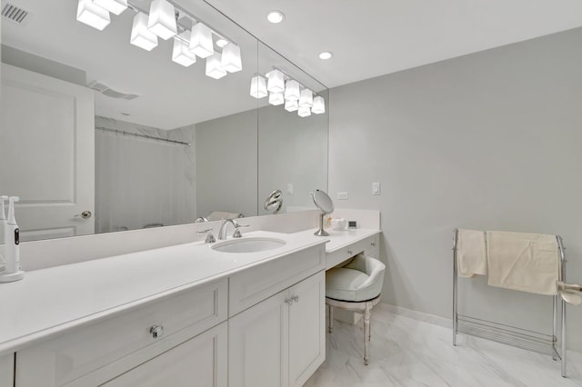 bathroom with vanity and walk in shower