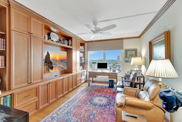 living room with ceiling fan, light hardwood / wood-style floors, and ornamental molding