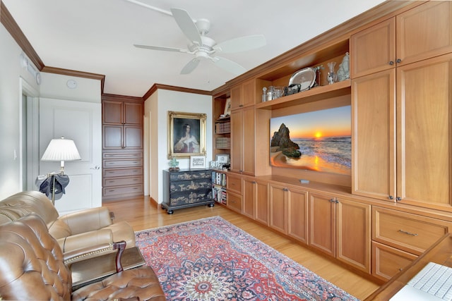 living room with ceiling fan, light wood-type flooring, and crown molding