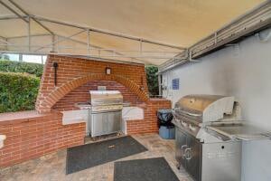 view of patio / terrace featuring a grill and exterior kitchen