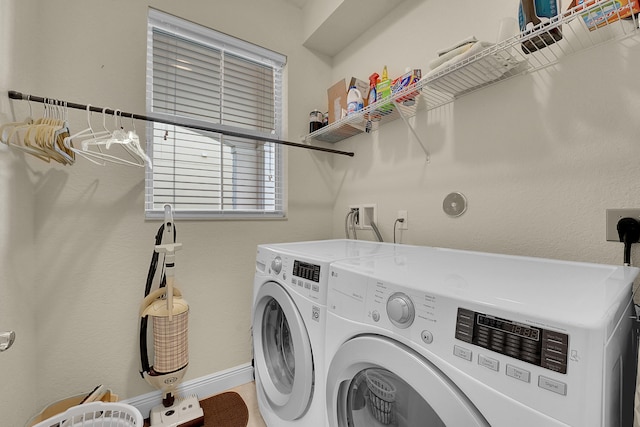 laundry room with separate washer and dryer