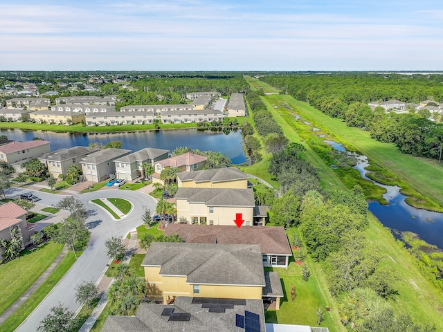 drone / aerial view with a water view