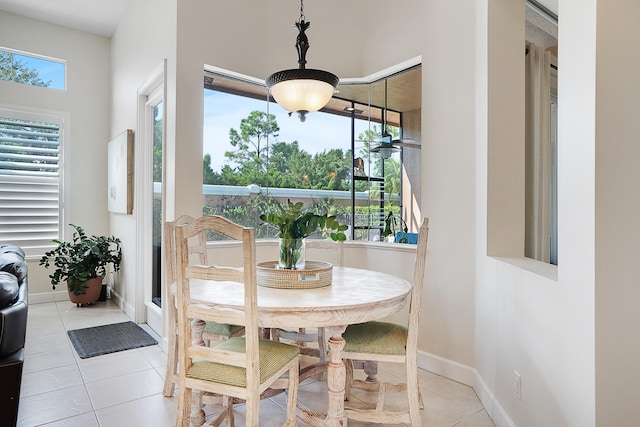 dining room featuring light tile patterned floors