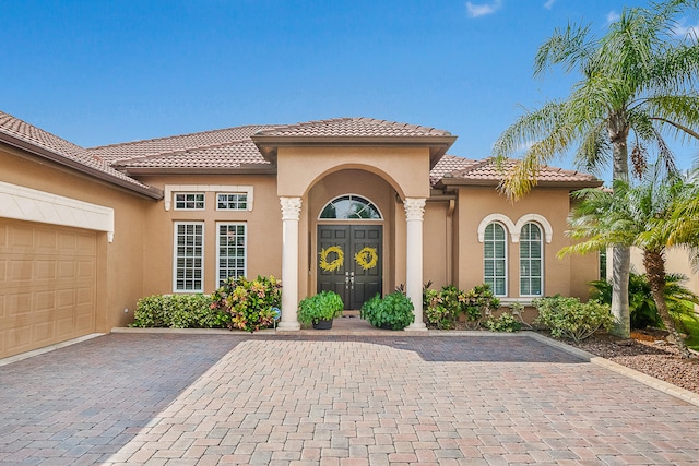 property entrance with a garage