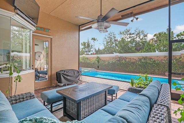 view of patio / terrace with ceiling fan, an outdoor living space, a fenced in pool, and area for grilling