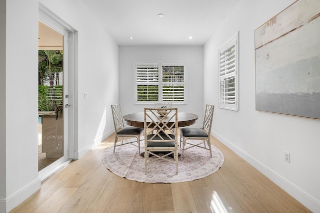 200 NE 6th Ct, Boca Raton, FL 33432 - dining room with light wood-type flooring, baseboards, and recessed lighting