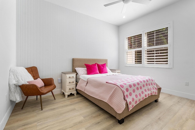 200 NE 6th Ct, Boca Raton, FL 33432 - bedroom featuring light wood finished floors, baseboards, and a ceiling fan