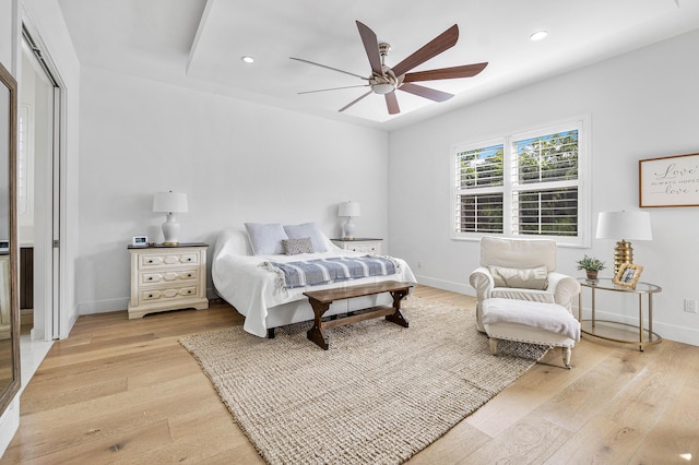 200 NE 6th Ct, Boca Raton, FL 33432 - bedroom with light wood finished floors, baseboards, recessed lighting, and ceiling fan