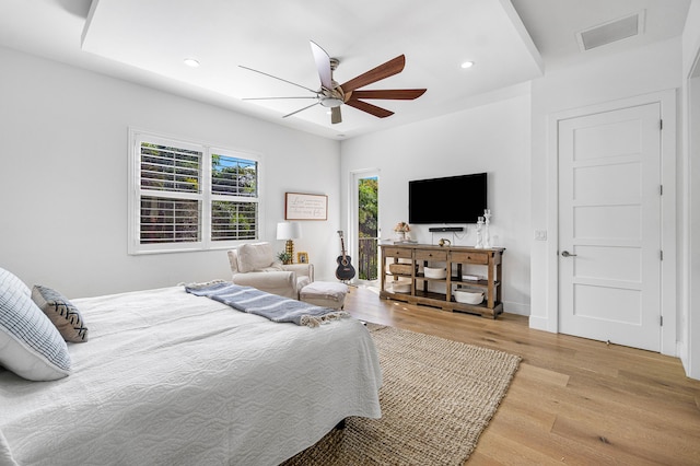 200 NE 6th Ct, Boca Raton, FL 33432 - bedroom with light wood-style floors, recessed lighting, and a ceiling fan