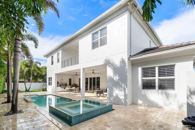 200 NE 6th Ct, Boca Raton, FL 33432 - back of property featuring a ceiling fan, stucco siding, and a patio area