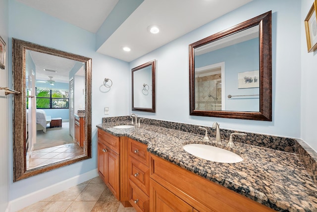 bathroom with tile patterned flooring and vanity