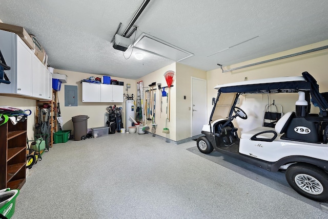 garage with gas water heater, a garage door opener, and electric panel