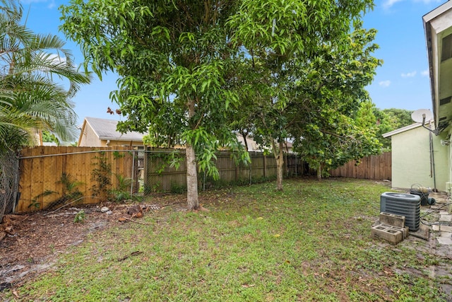 view of yard with central AC