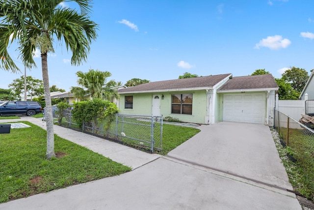 ranch-style home with a garage and a front lawn