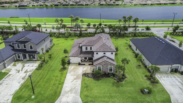 drone / aerial view with a water view