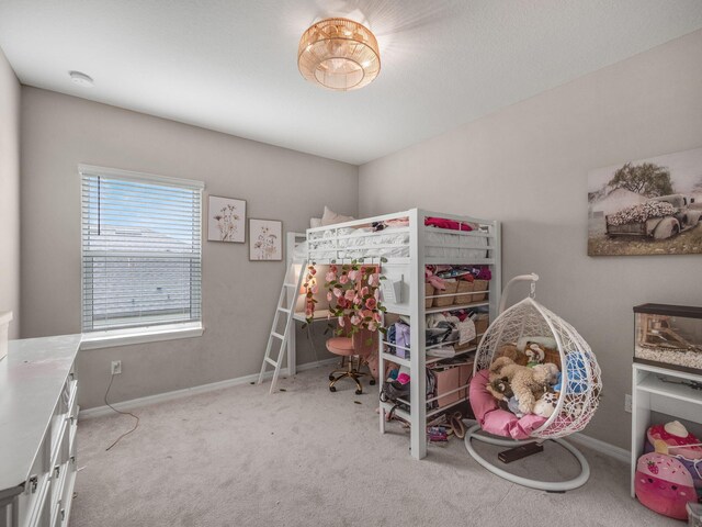 bedroom with light colored carpet