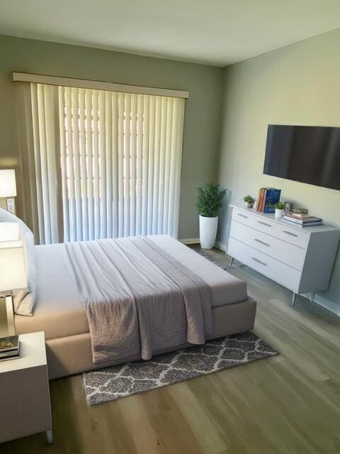 bedroom featuring hardwood / wood-style flooring