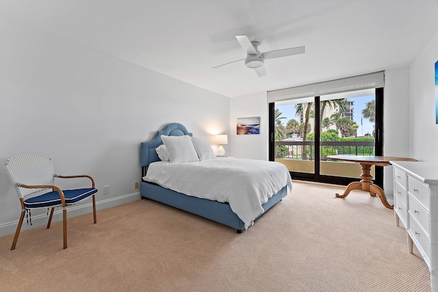 bedroom featuring ceiling fan, access to exterior, and light carpet