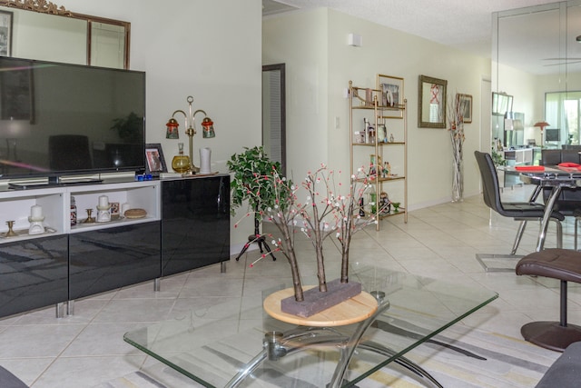 tiled living room with a textured ceiling