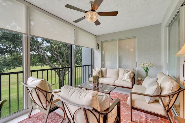 sunroom / solarium with ceiling fan