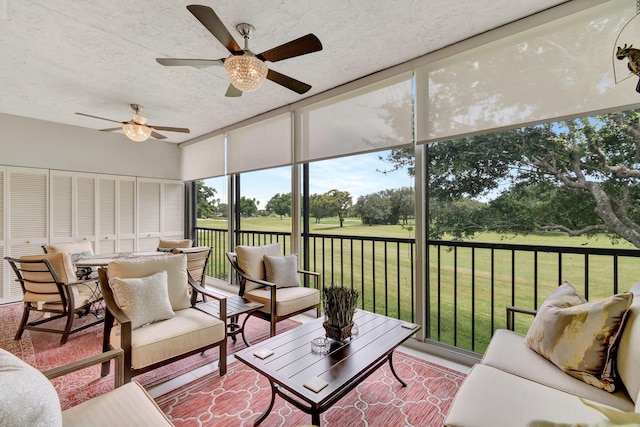 sunroom / solarium with ceiling fan