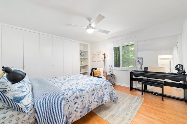 bedroom featuring a closet, ceiling fan, and light hardwood / wood-style flooring