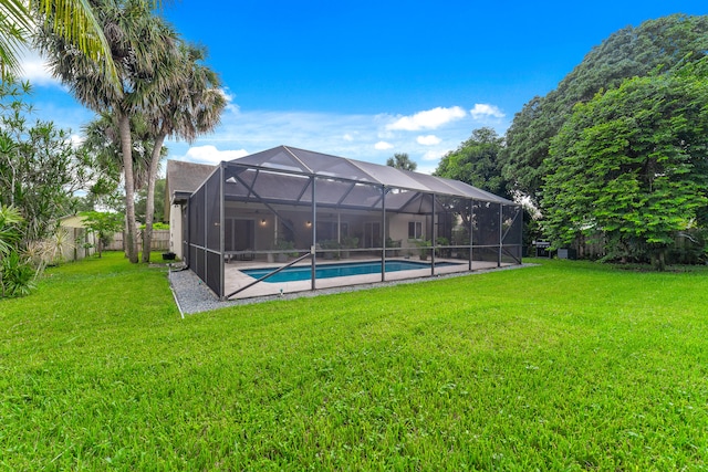 view of yard with a lanai