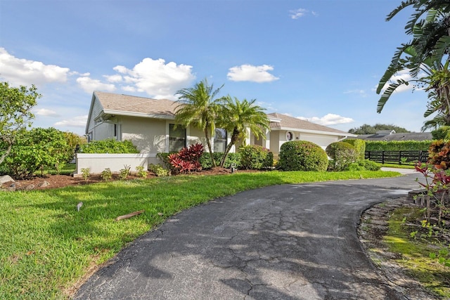 view of front of home featuring a front yard