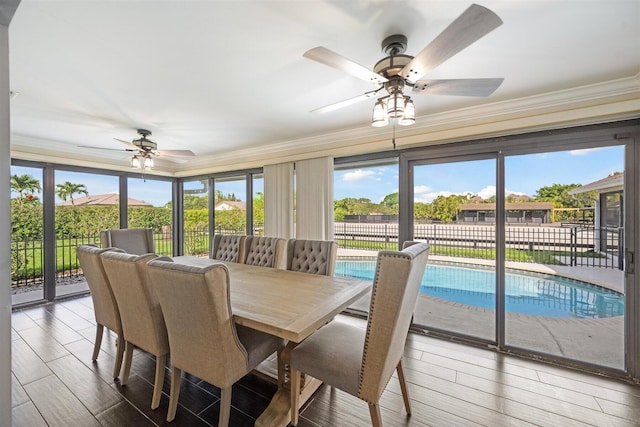 sunroom / solarium with ceiling fan