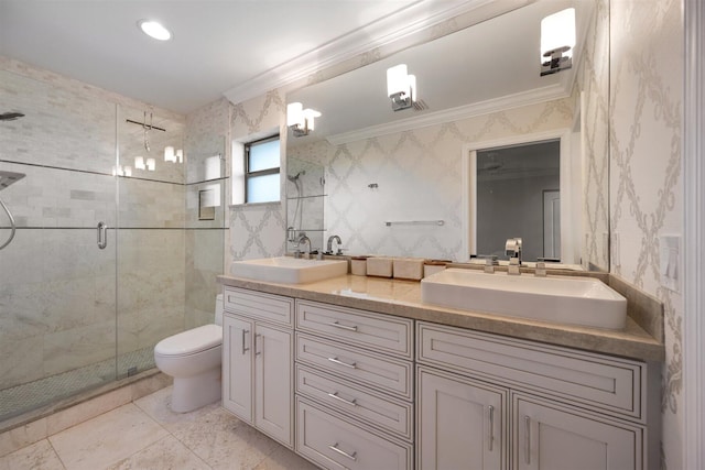 bathroom featuring vanity, toilet, an enclosed shower, and ornamental molding