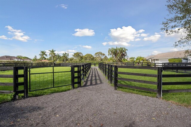 view of gate featuring a rural view