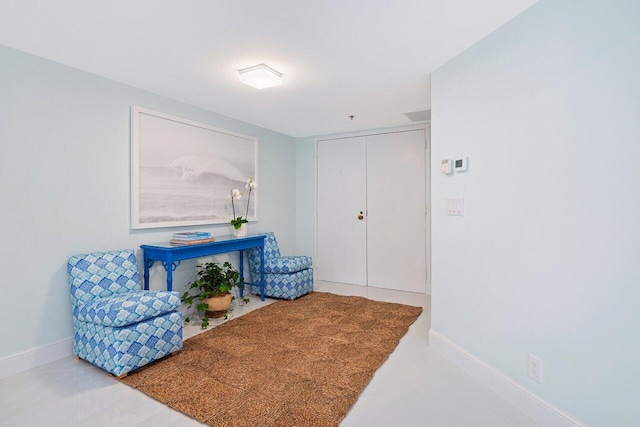 living area with baseboards