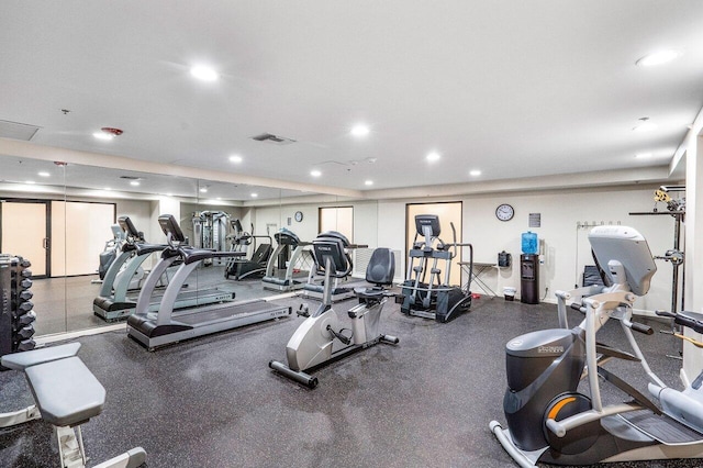 exercise room featuring visible vents and recessed lighting