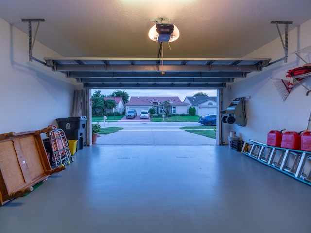 garage featuring a garage door opener