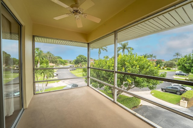 balcony featuring a ceiling fan