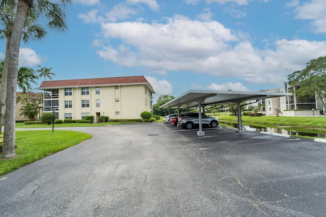 view of partially covered parking lot
