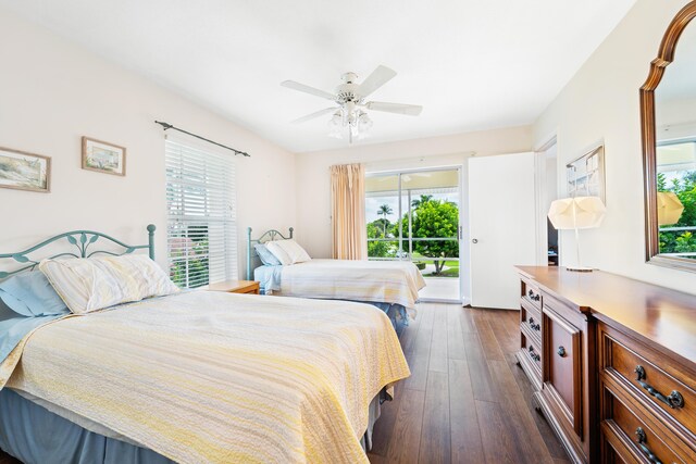 bedroom with access to exterior, ceiling fan, and dark hardwood / wood-style floors